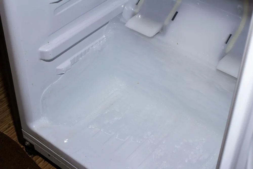 Why Is My Fridge Leaking Water Inside? 5 Most Common Causes & Fixes