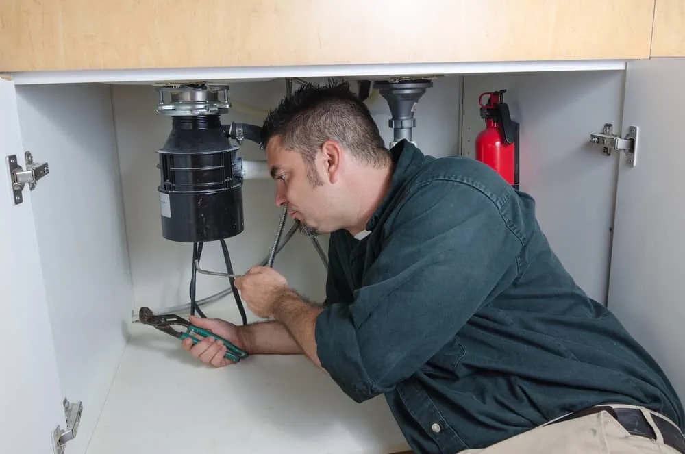 Garbage Disposal Making Loud Noise: Reasons & Fixes