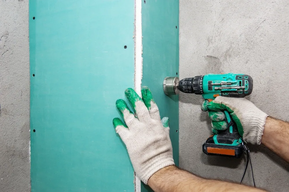 Can You Put Drywall Over Drywall? Yes! [4-Step Guide]