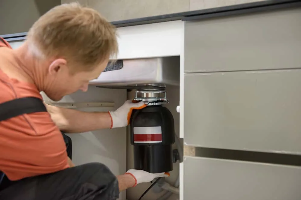 Smoke Coming From Garbage Disposal? (Do This!)